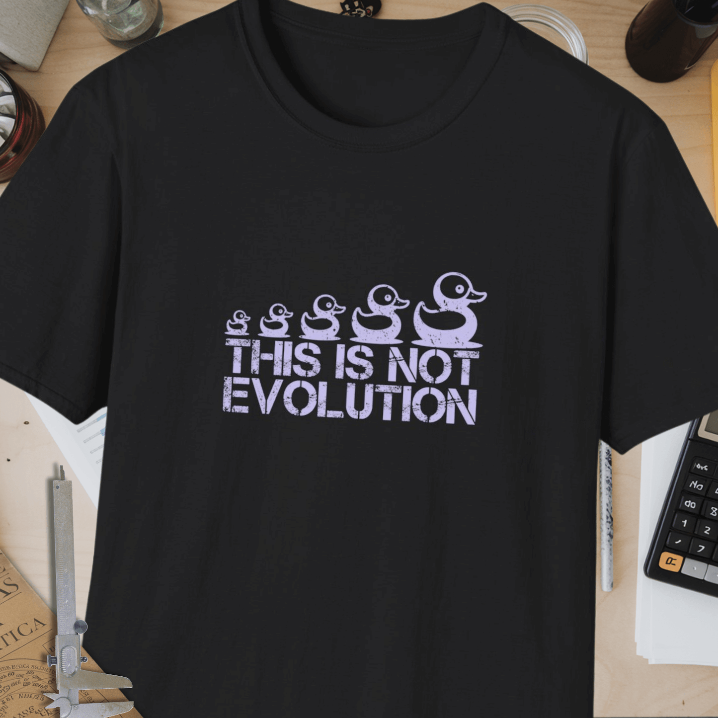 This Is Not Evolution Unisex Softstyle T-Shirt