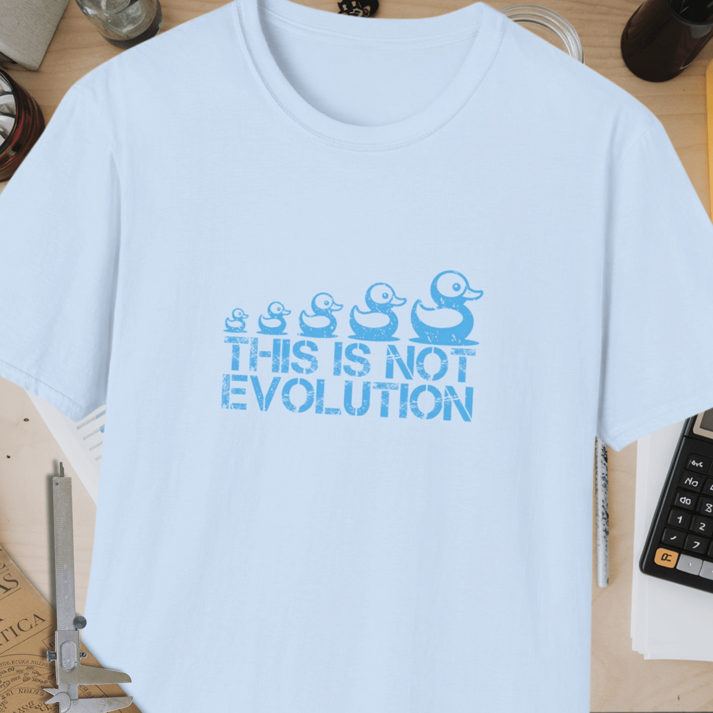 This Is Not Evolution Unisex Softstyle T-Shirt